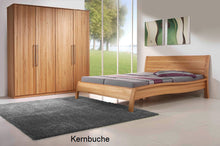 Lade das Bild in den Galerie-Viewer, Massivholzbett Akzent und Schrank Kubus in Holzart Kernbuche